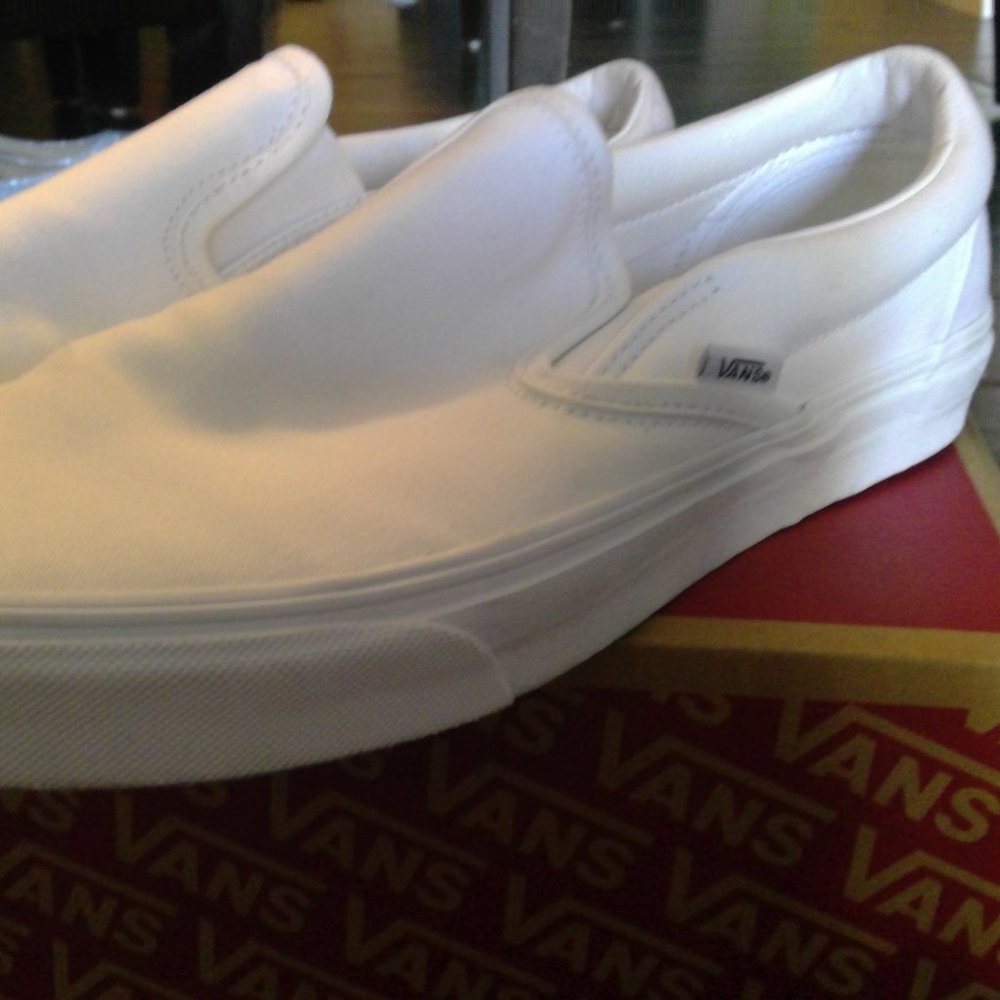 White Slip-ons Vans